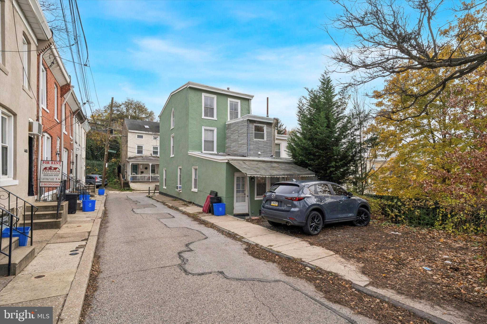 352 Carson Street Philadelphia, PA 19128 - Photo 35 of 35 a car parked in front of a building
