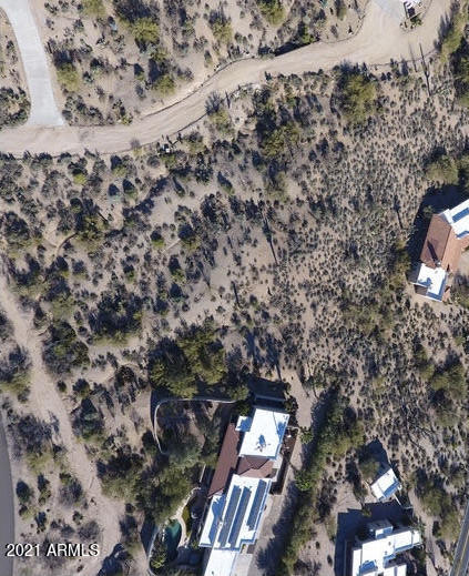 9511 East Romping Road, Unit 107 Carefree, AZ 85377 - Photo 5 of 48 Looking at the lot from the air