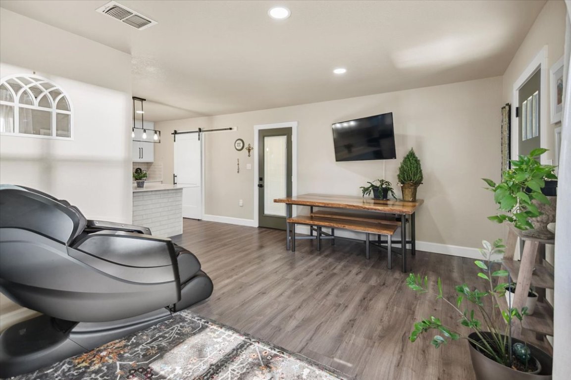1236 Martin Street Mason, TX 76856 - Photo 17 of 40 a living room with furniture and a flat screen tv