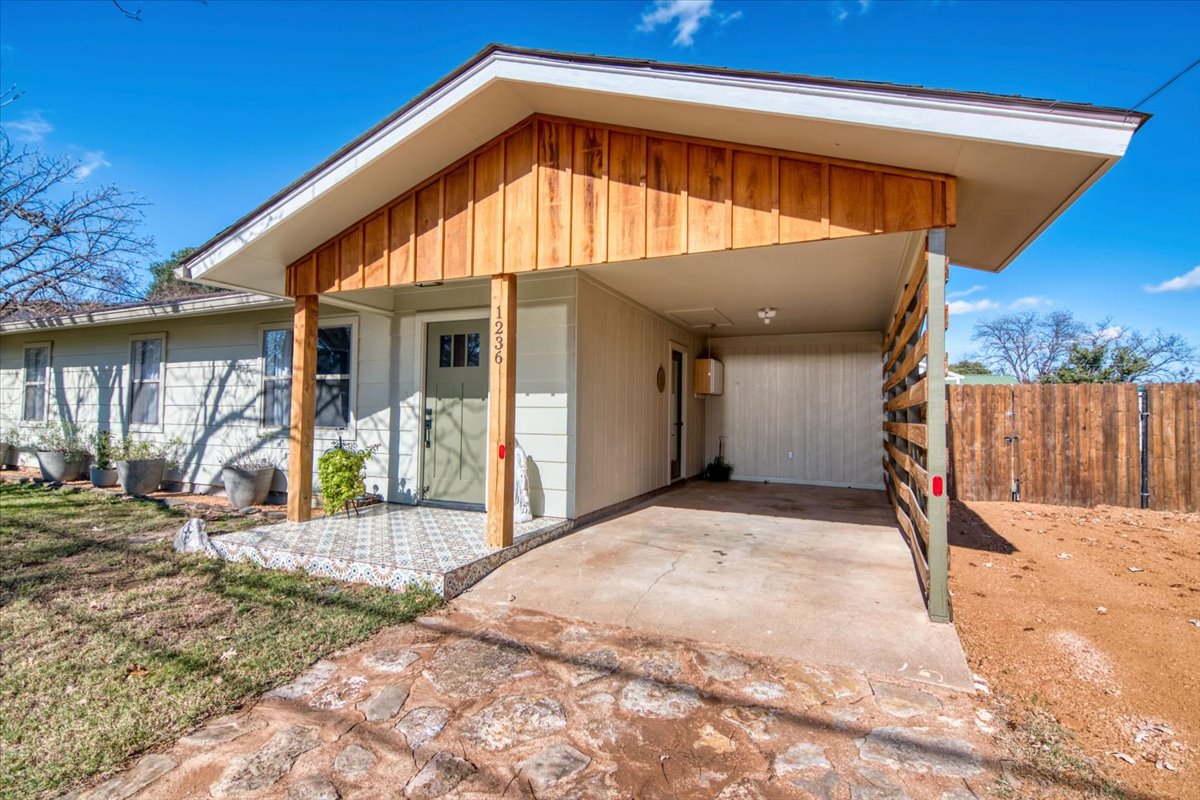 1236 Martin Street Mason, TX 76856 - Photo 2 of 40 a view of a house with backyard and porch