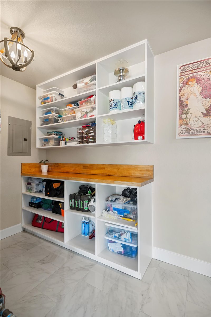 1236 Martin Street Mason, TX 76856 - Photo 28 of 40 a room with storage and a book shelf