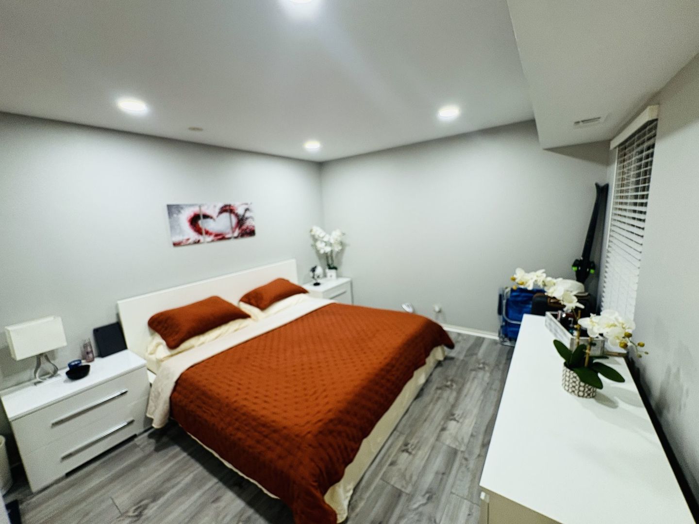 1930 Kenilworth Circle, Unit E Hoffman Estates, IL 60169 - Photo 8 of 13 a bedroom with a bed and a couch