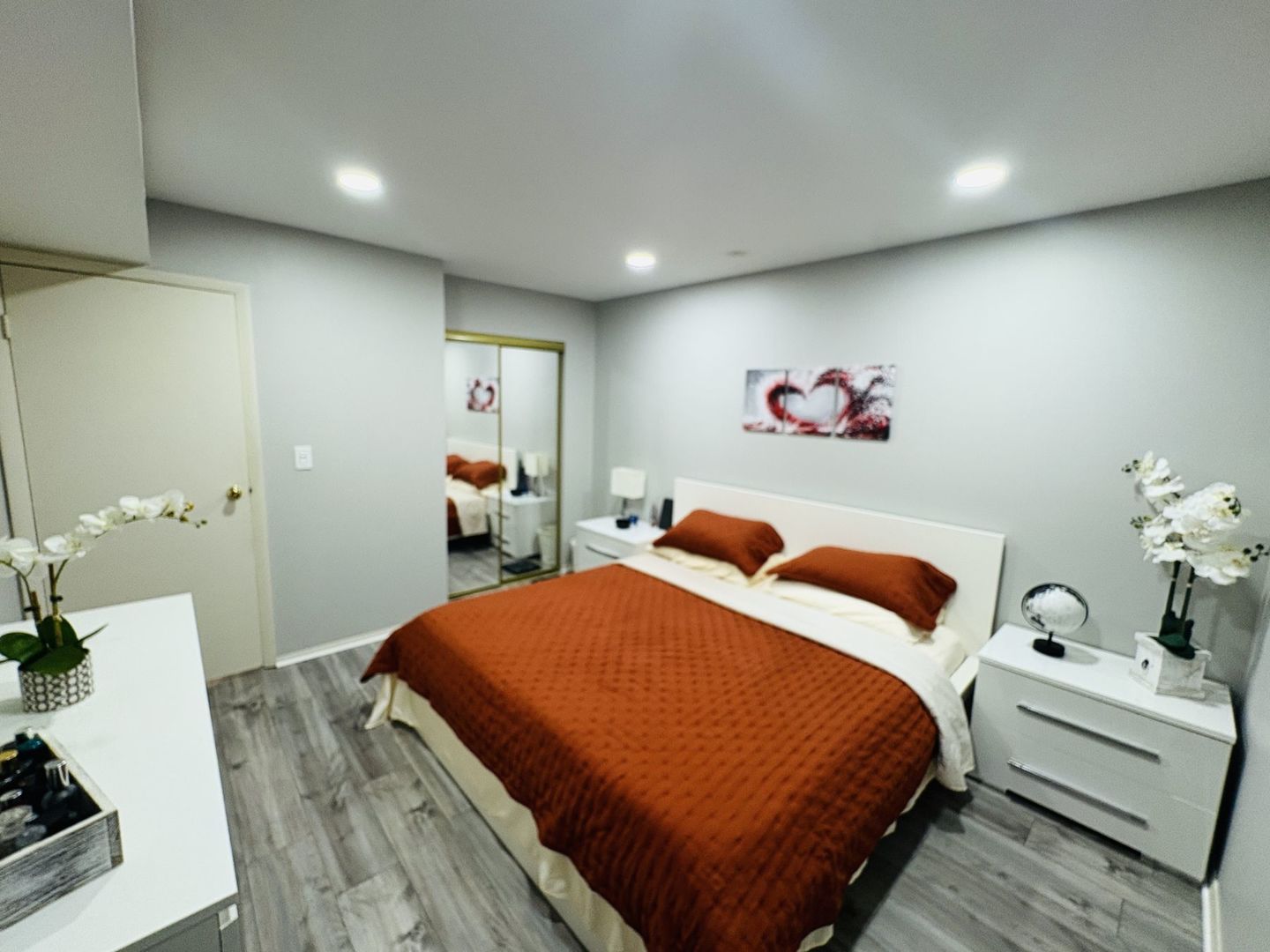 1930 Kenilworth Circle, Unit E Hoffman Estates, IL 60169 - Photo 9 of 13 a bedroom with a bed and a couch