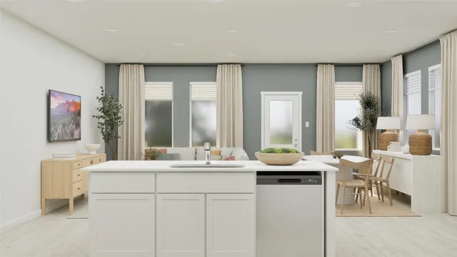 a room with a sink and a mirror