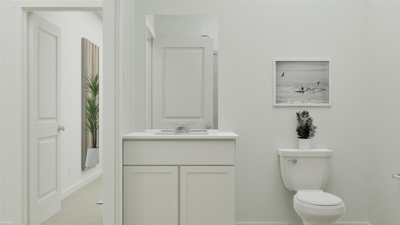 117 Stumpy Street San Marcos, TX 78666 - Photo 25 of 30 a bathroom with a sink a toilet and mirror