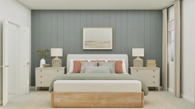 a bedroom with a bed and a potted plant on the dresser