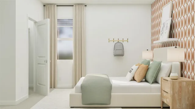 a bedroom with a bed and a mirror