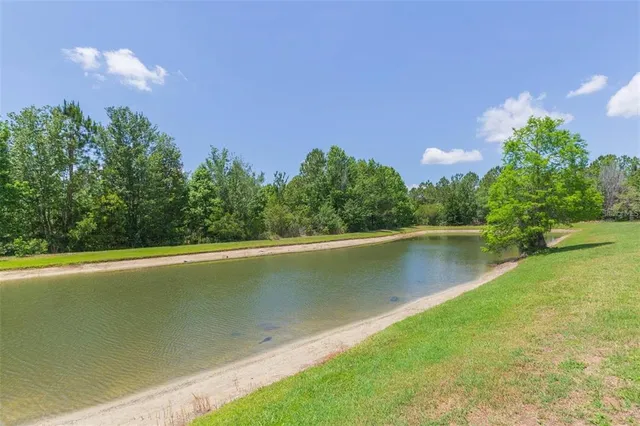 a view of a lake from a balcony