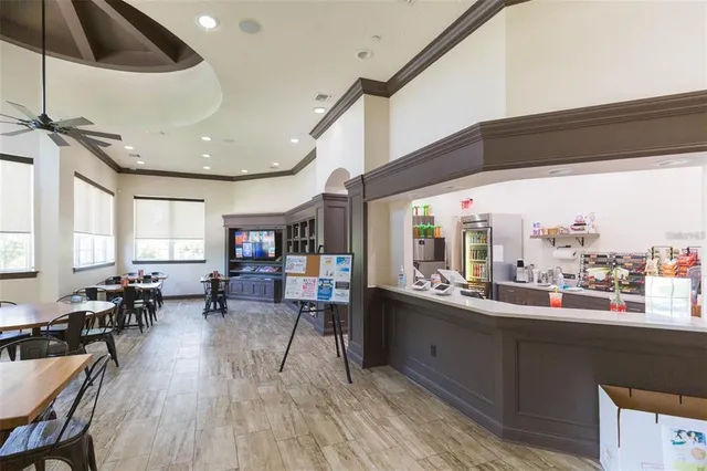 a very nice looking living room with a large window