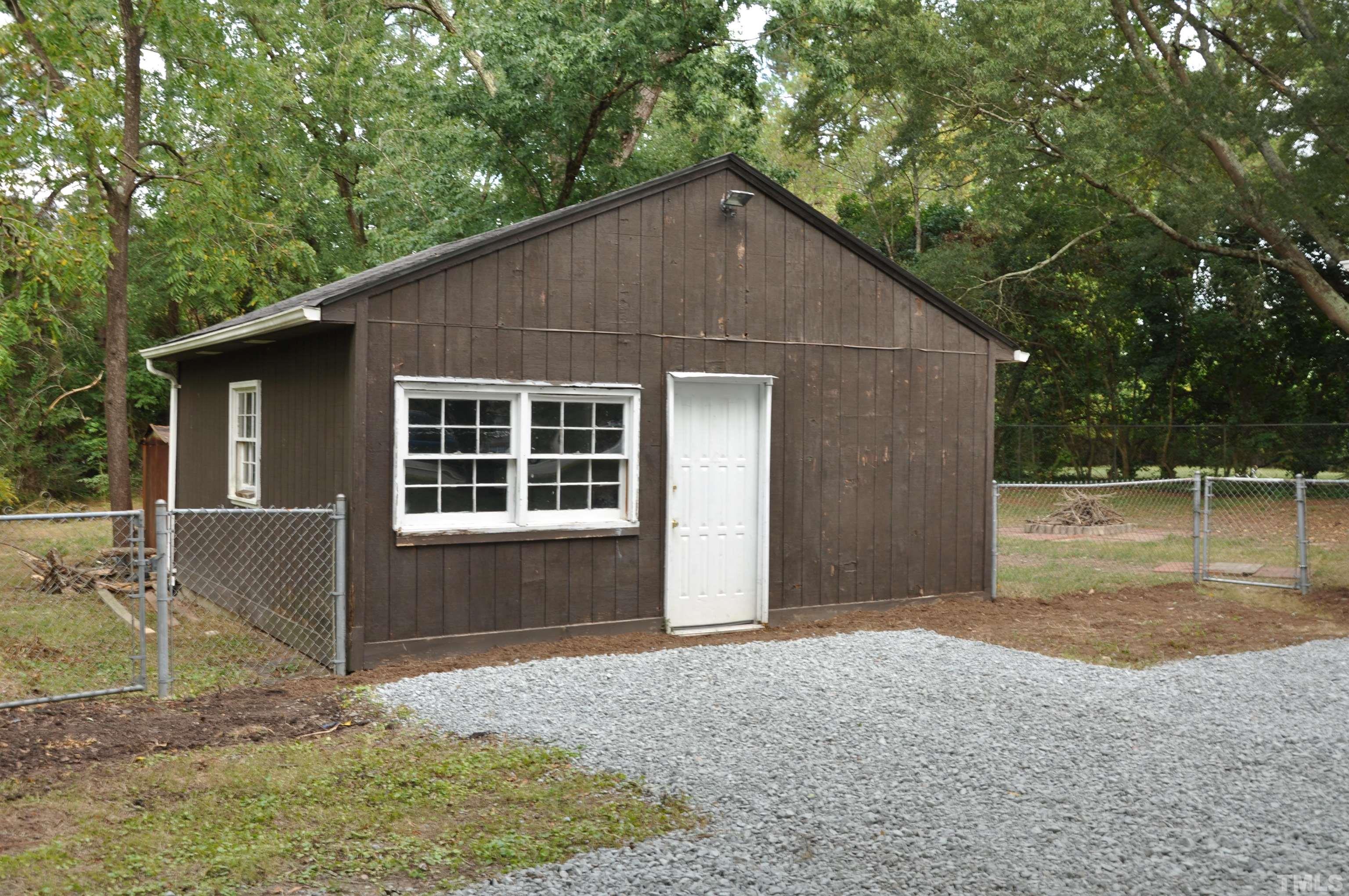 633 Morreene Road Durham, NC 27705 - Photo 5 of 29 Large detached workshop (20' x 20') could make the perfect studio, home office, or storage area.