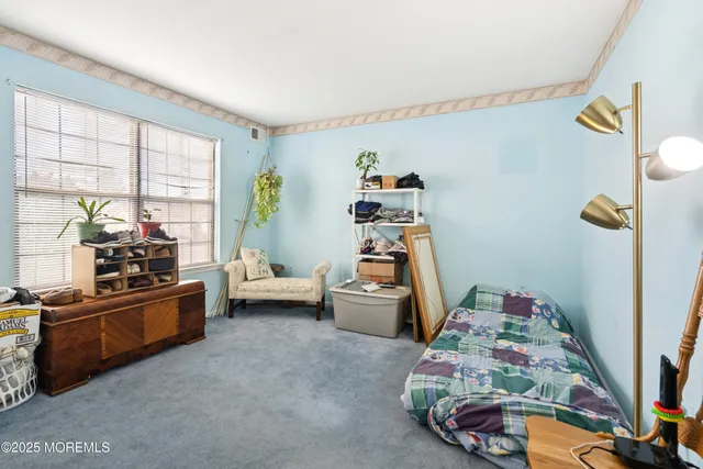 a view of room with workspace and entryway