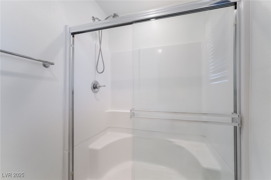 715 Pickled Pepper Place Henderson, NV 89011 - Photo 21 of 31 Full bathroom with a shower stall