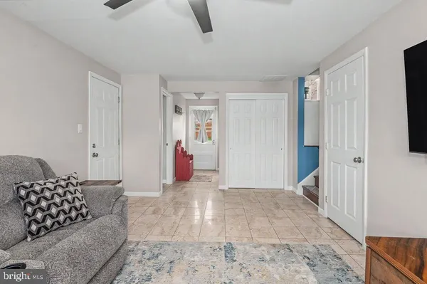a living room with furniture and a couch