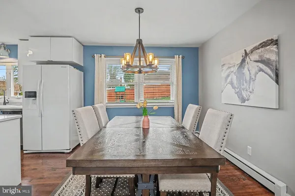 a view of a dining room with furniture window and outside view
