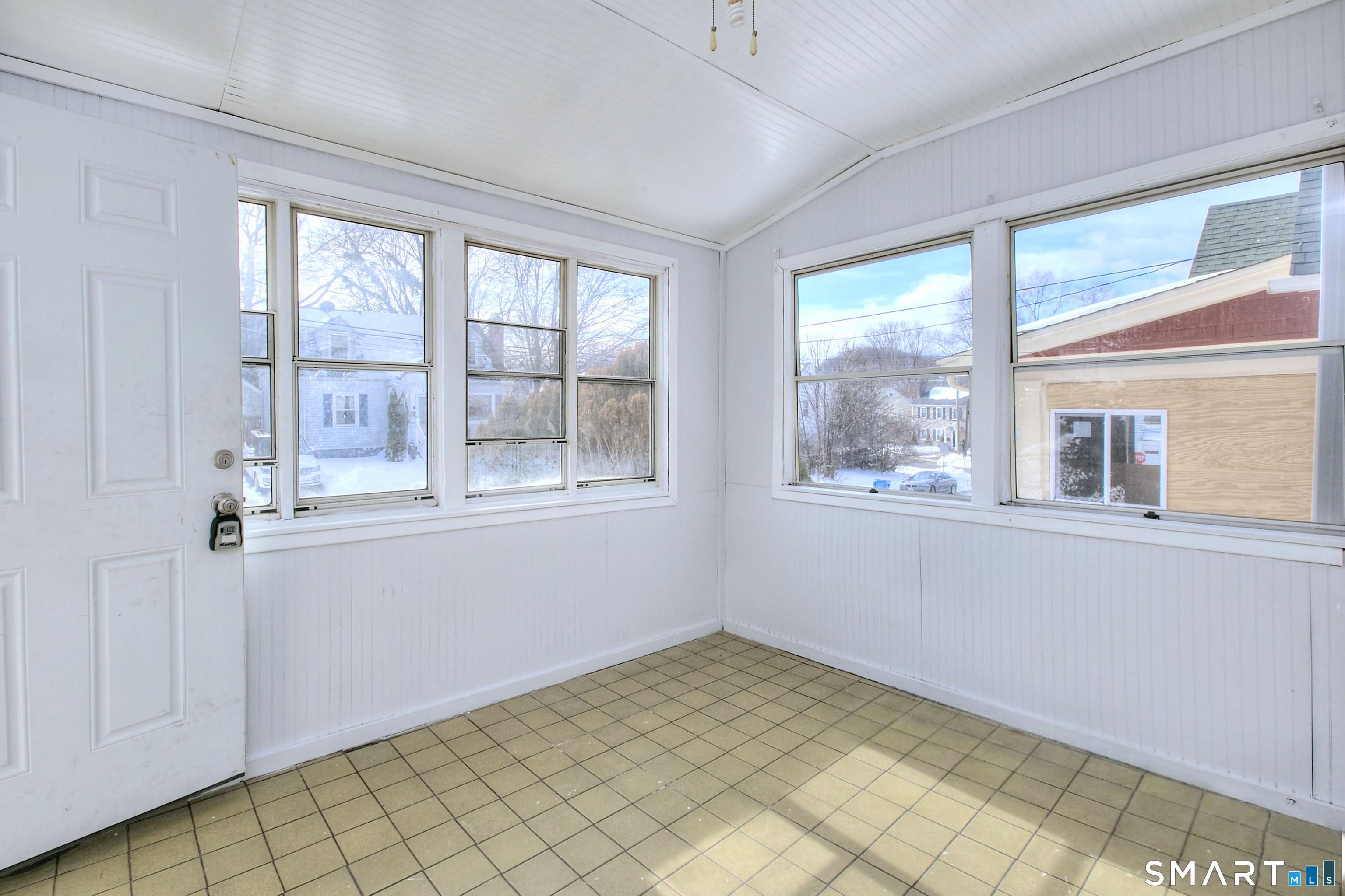 115 3rd Street Hamden, CT 06514 - Photo 2 of 34 a view of empty room with window