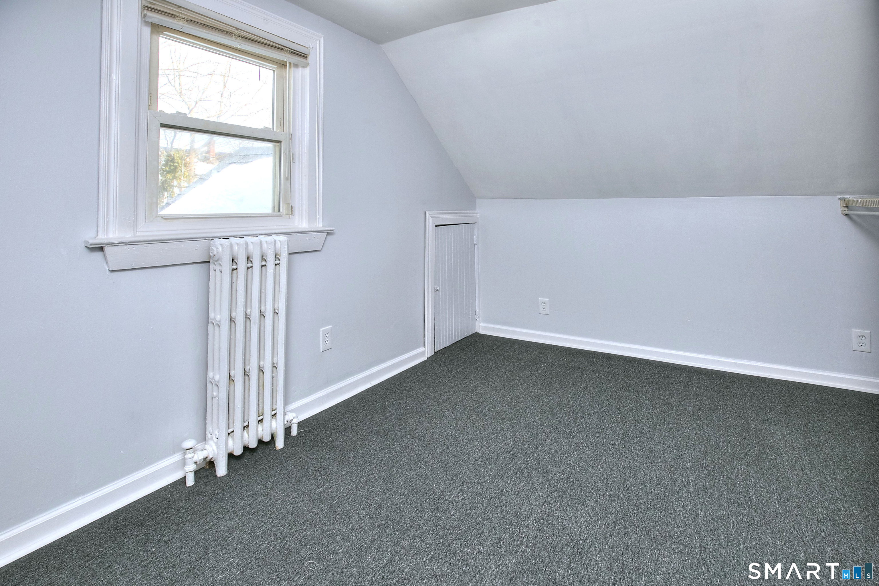 115 3rd Street Hamden, CT 06514 - Photo 22 of 34 an empty room with a window