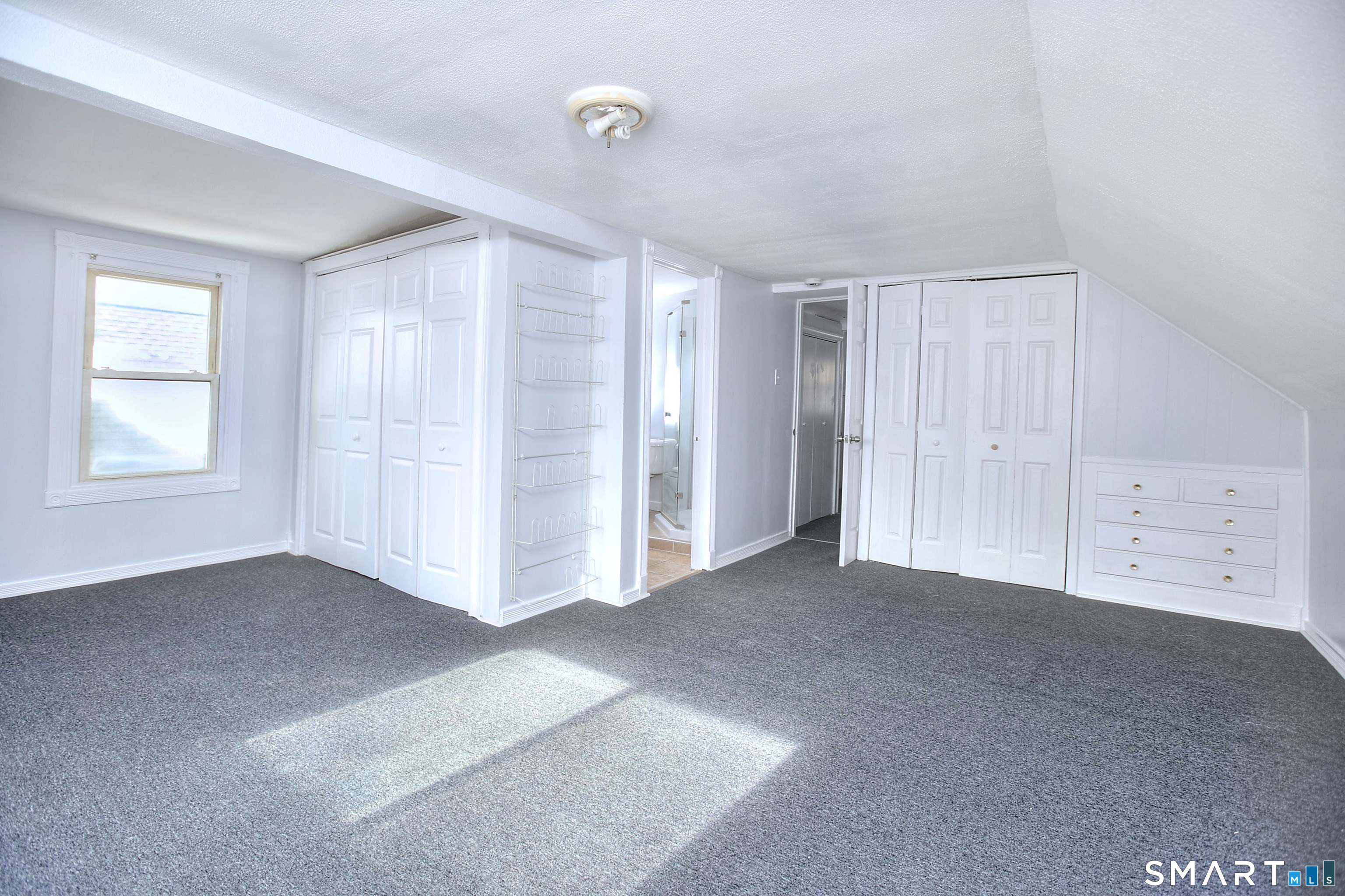 115 3rd Street Hamden, CT 06514 - Photo 26 of 34 an empty room with windows