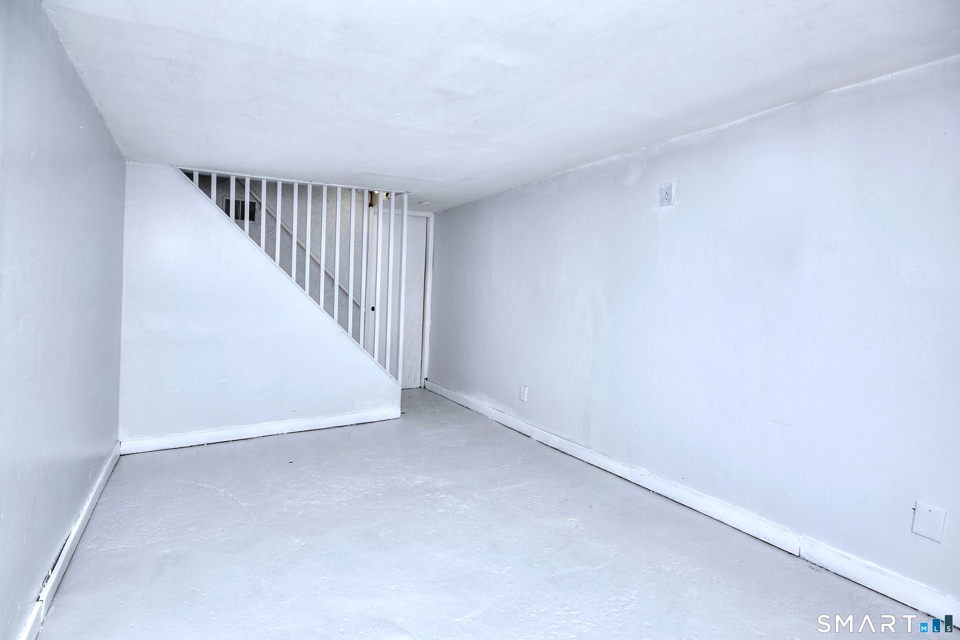 115 3rd Street Hamden, CT 06514 - Photo 28 of 34 a view of an empty room with stairs