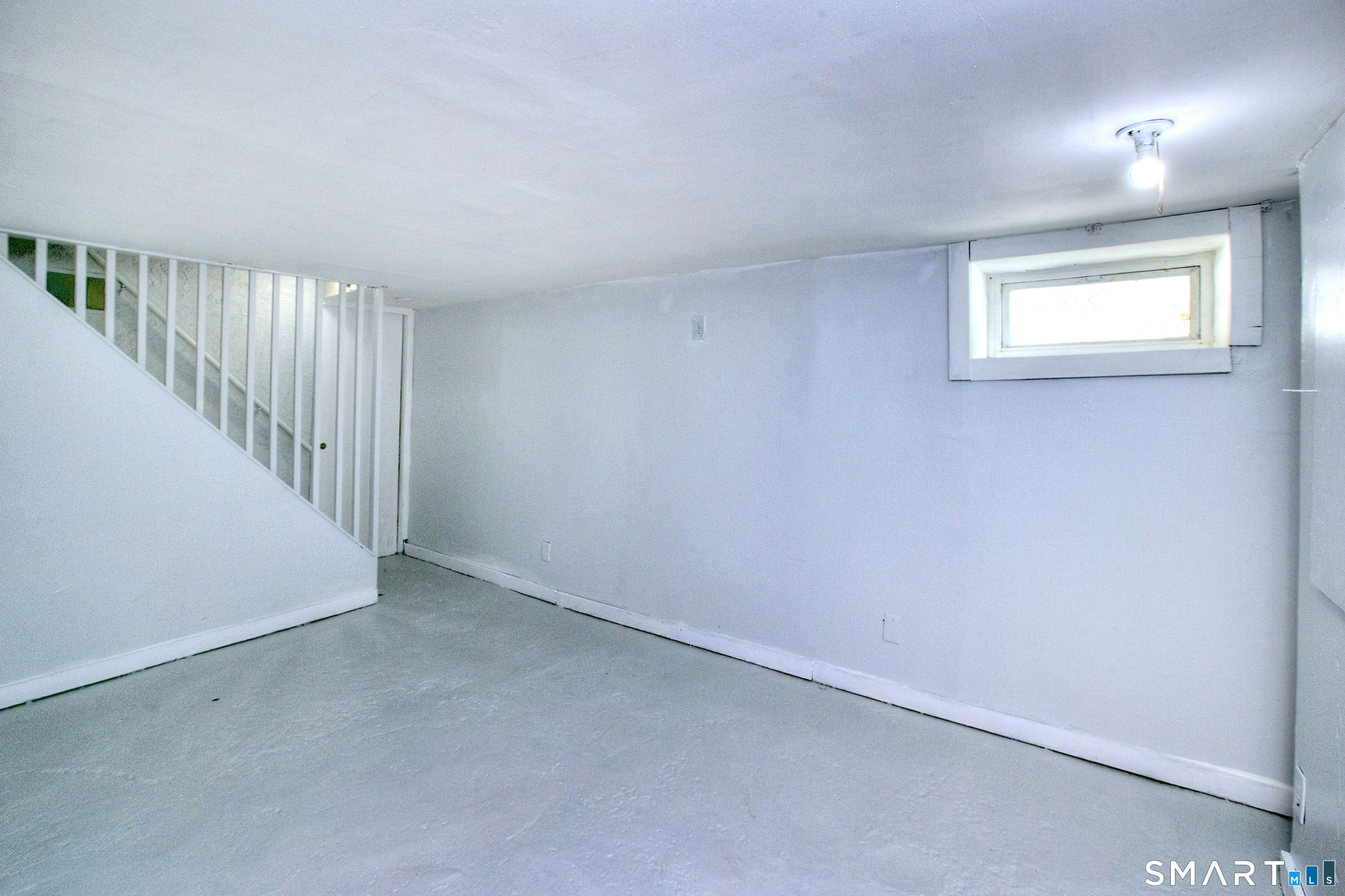 115 3rd Street Hamden, CT 06514 - Photo 29 of 34 a view of an empty room with a window