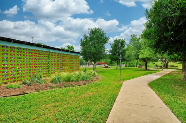 a view of building with garden