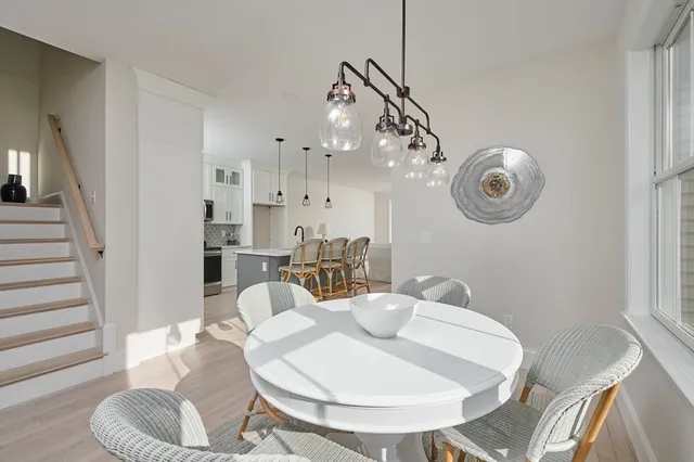 a view of a dining room with furniture
