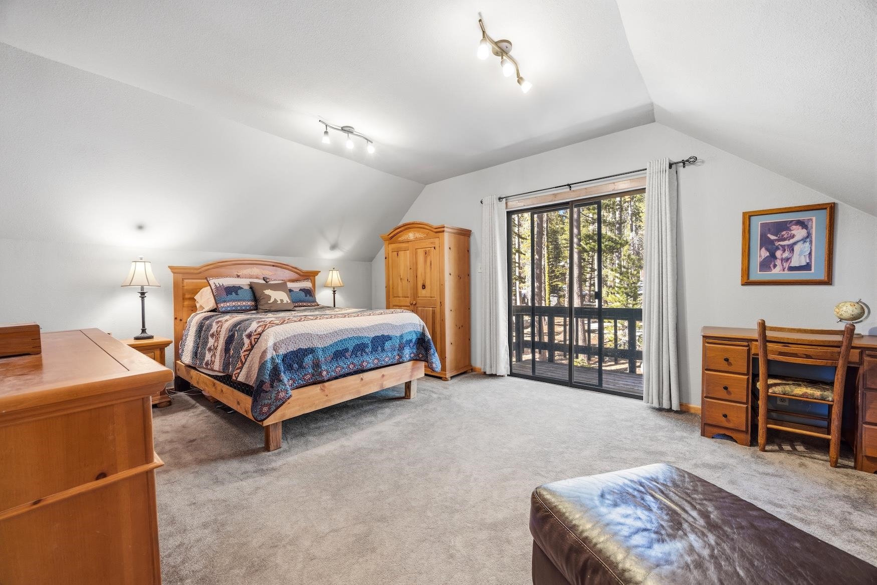 21146 Donner Pass Road Soda Springs, CA 95728 - Photo 18 of 25 a bedroom with a bed and a window