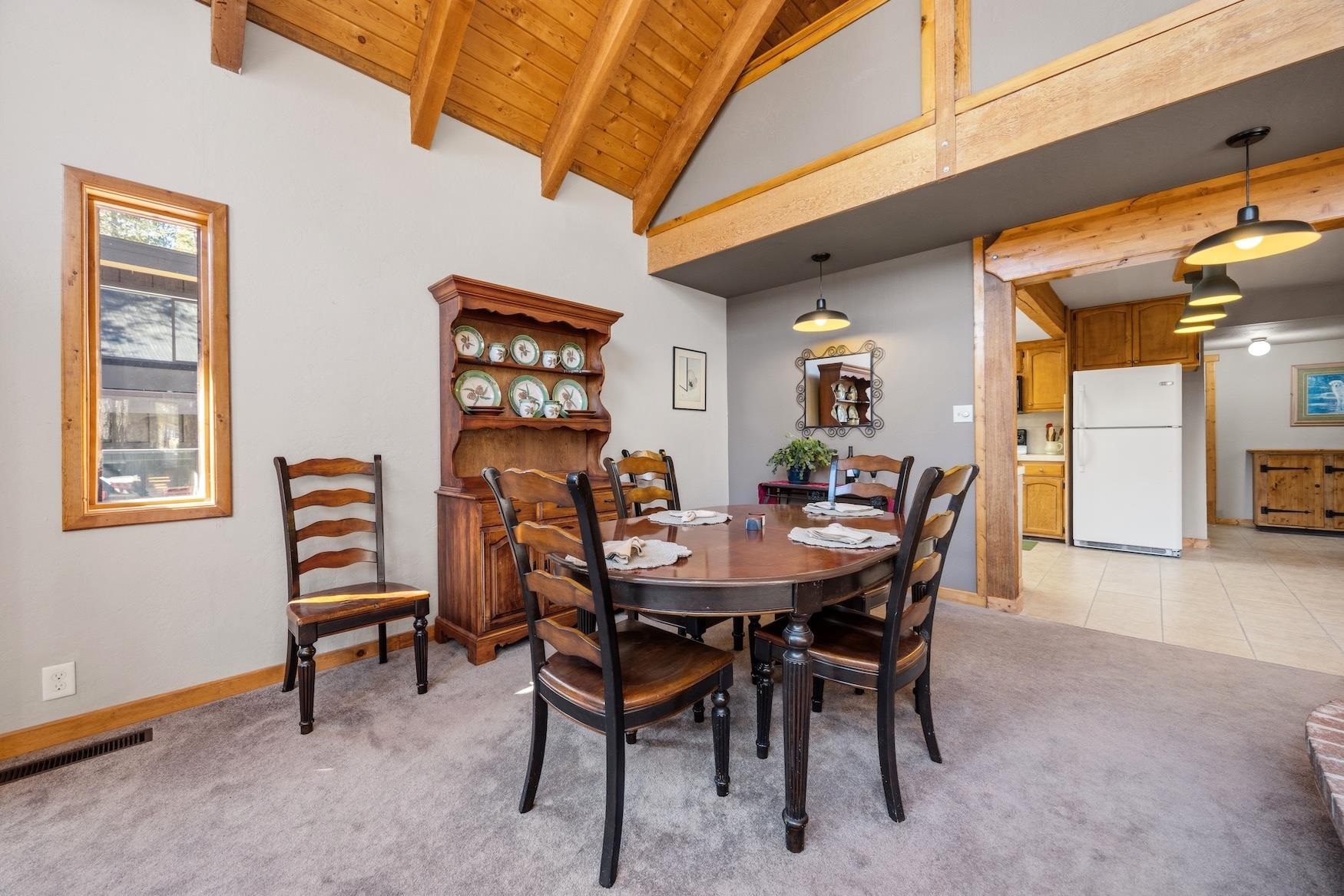 21146 Donner Pass Road Soda Springs, CA 95728 - Photo 5 of 25 a view of a dining room with furniture
