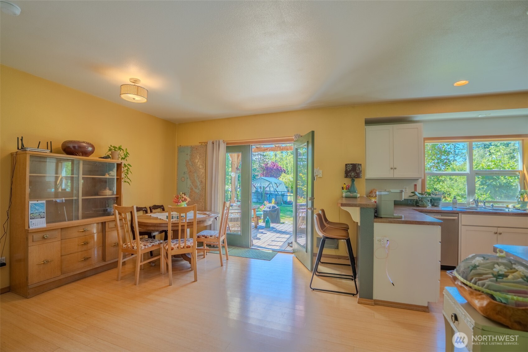 5178 Orcas Road Orcas Island, WA 98245 - Photo 9 of 37 a living room with furniture a large window and wooden floor