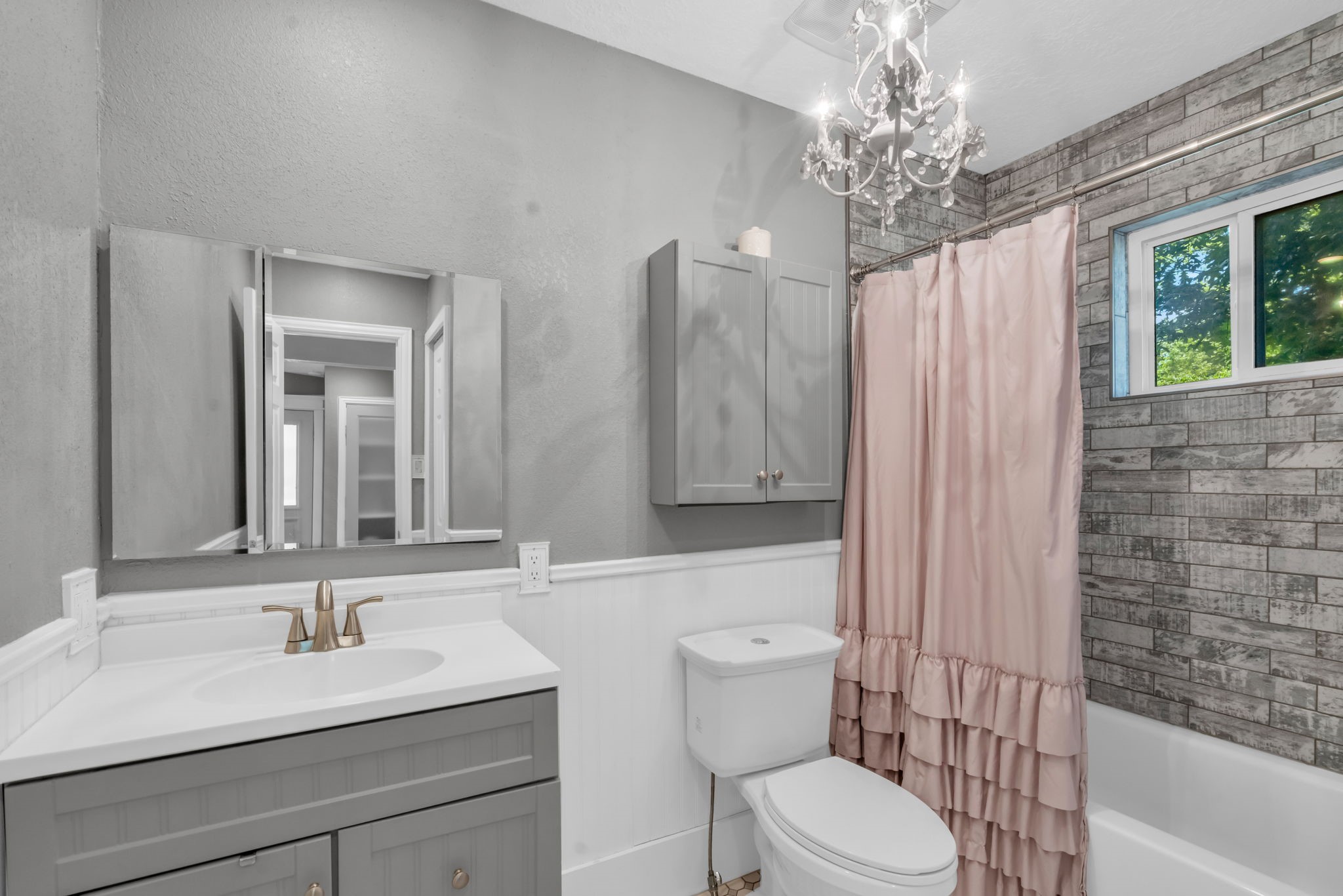 17821 Brown Road Conroe, TX 77306 - Photo 47 of 50 a bathroom with a sink a toilet and shower