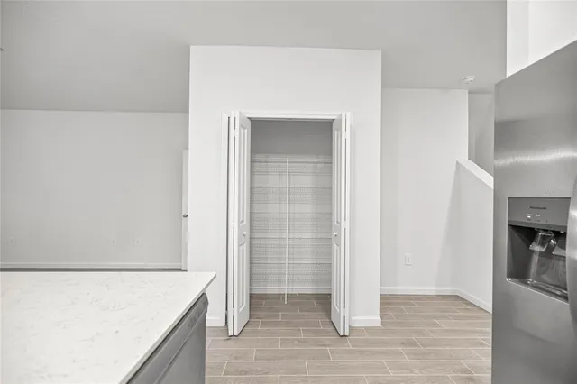 a view of livingroom with kitchen