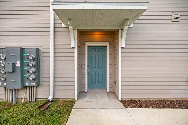 a view of a entryway door front of house