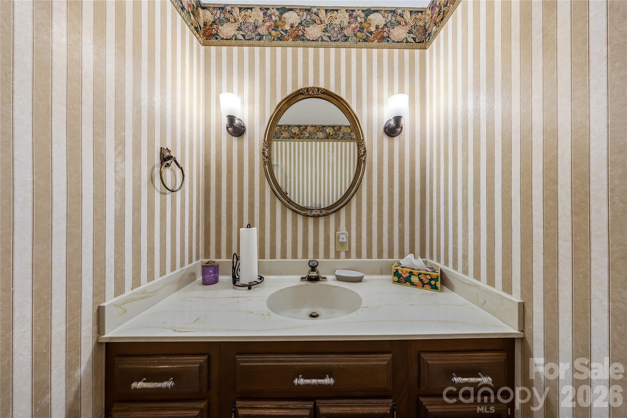 910 Rutledge Annex Hendersonville, NC 28739 - Photo 26 of 45 a bathroom with a sink and a mirror