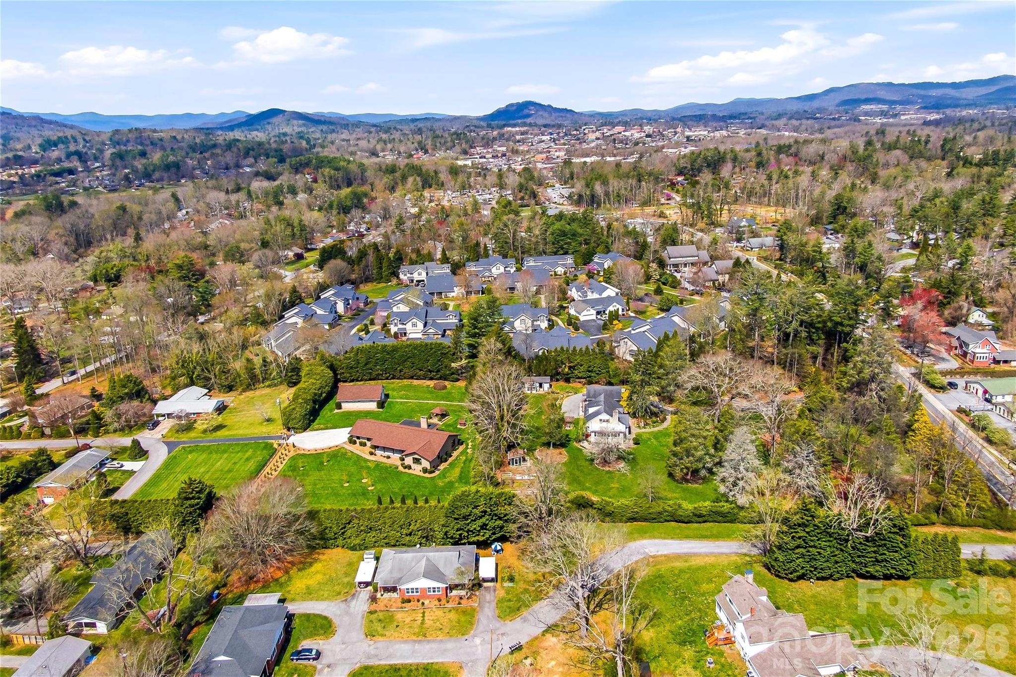 910 Rutledge Annex Hendersonville, NC 28739 - Photo 45 of 45 an aerial view of residential houses with outdoor space and street view