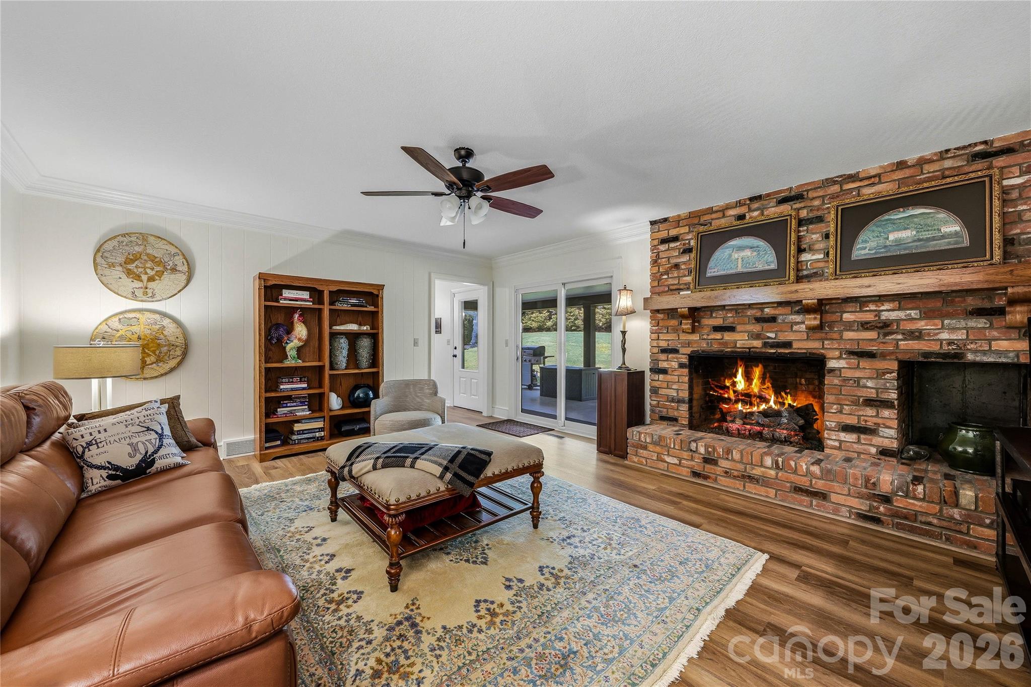 910 Rutledge Annex Hendersonville, NC 28739 - Photo 5 of 45 a living room with furniture and a fireplace