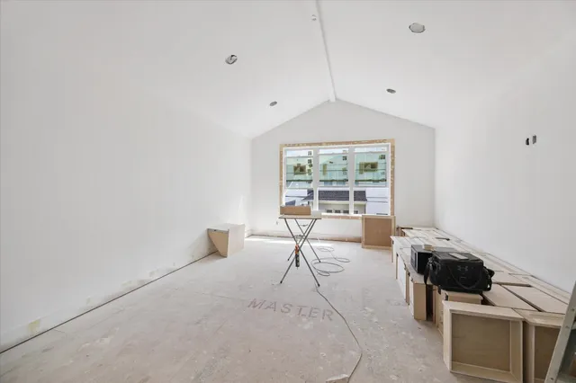 a workspace with furniture and a window