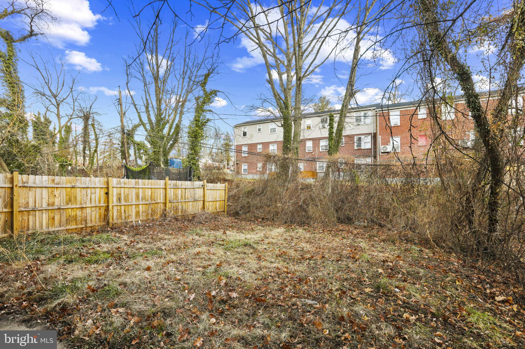 4511 Fairfax Road Baltimore, MD 21216 - Photo 34 of 35 a view of a yard with a house