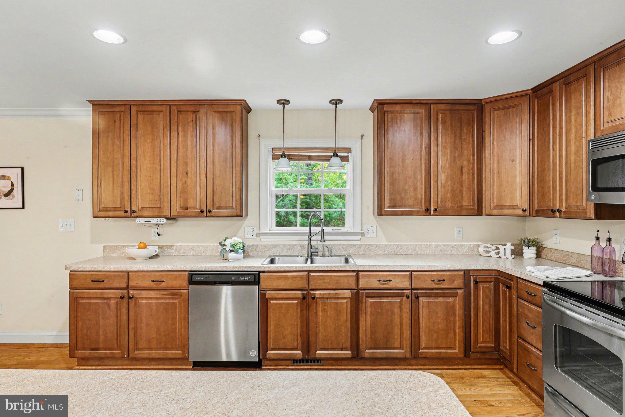 1564 Perry Road Winchester, VA 22602 - Photo 11 of 42 a kitchen with a sink and cabinets