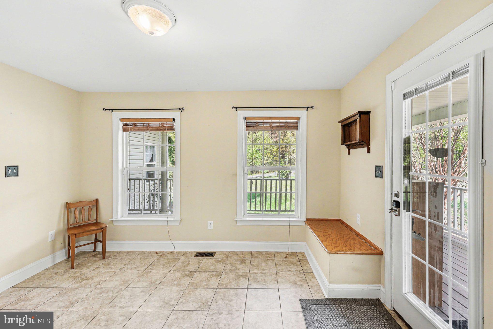 1564 Perry Road Winchester, VA 22602 - Photo 18 of 42 a living room with furniture and a window