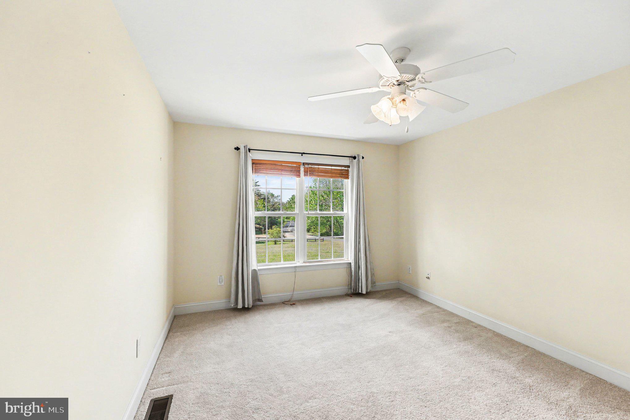 1564 Perry Road Winchester, VA 22602 - Photo 22 of 42 an empty room with a window