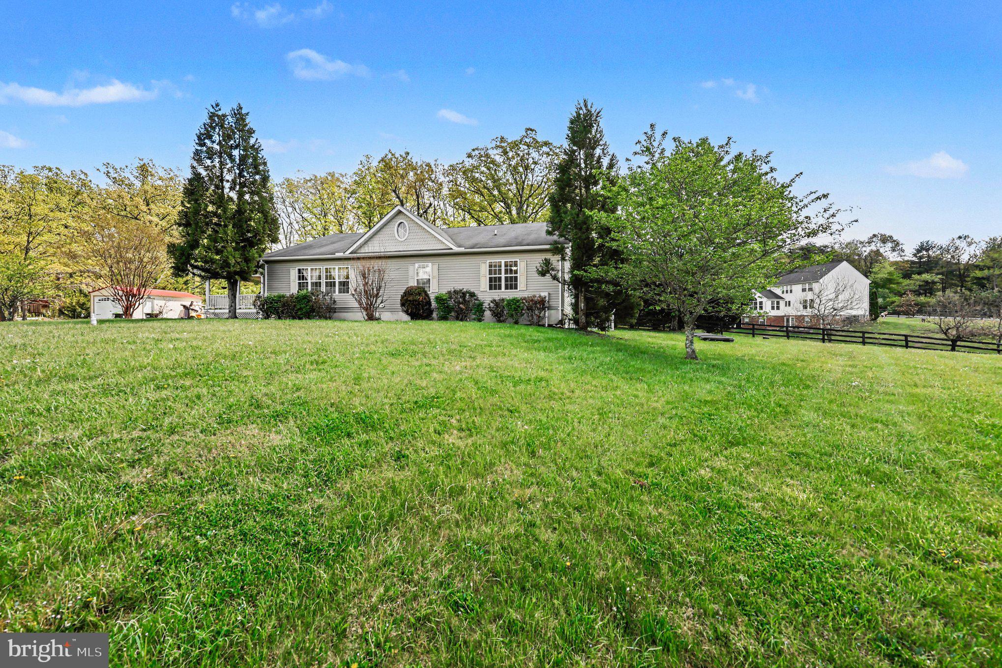 1564 Perry Road Winchester, VA 22602 - Photo 30 of 42 a view of a house with a big yard