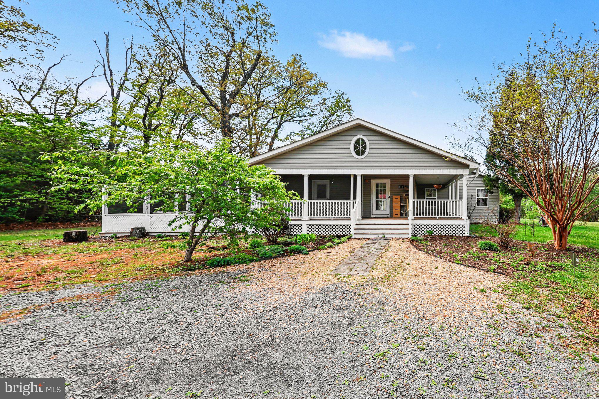 1564 Perry Road Winchester, VA 22602 - Photo 3 of 42 a front view of a house with a yard