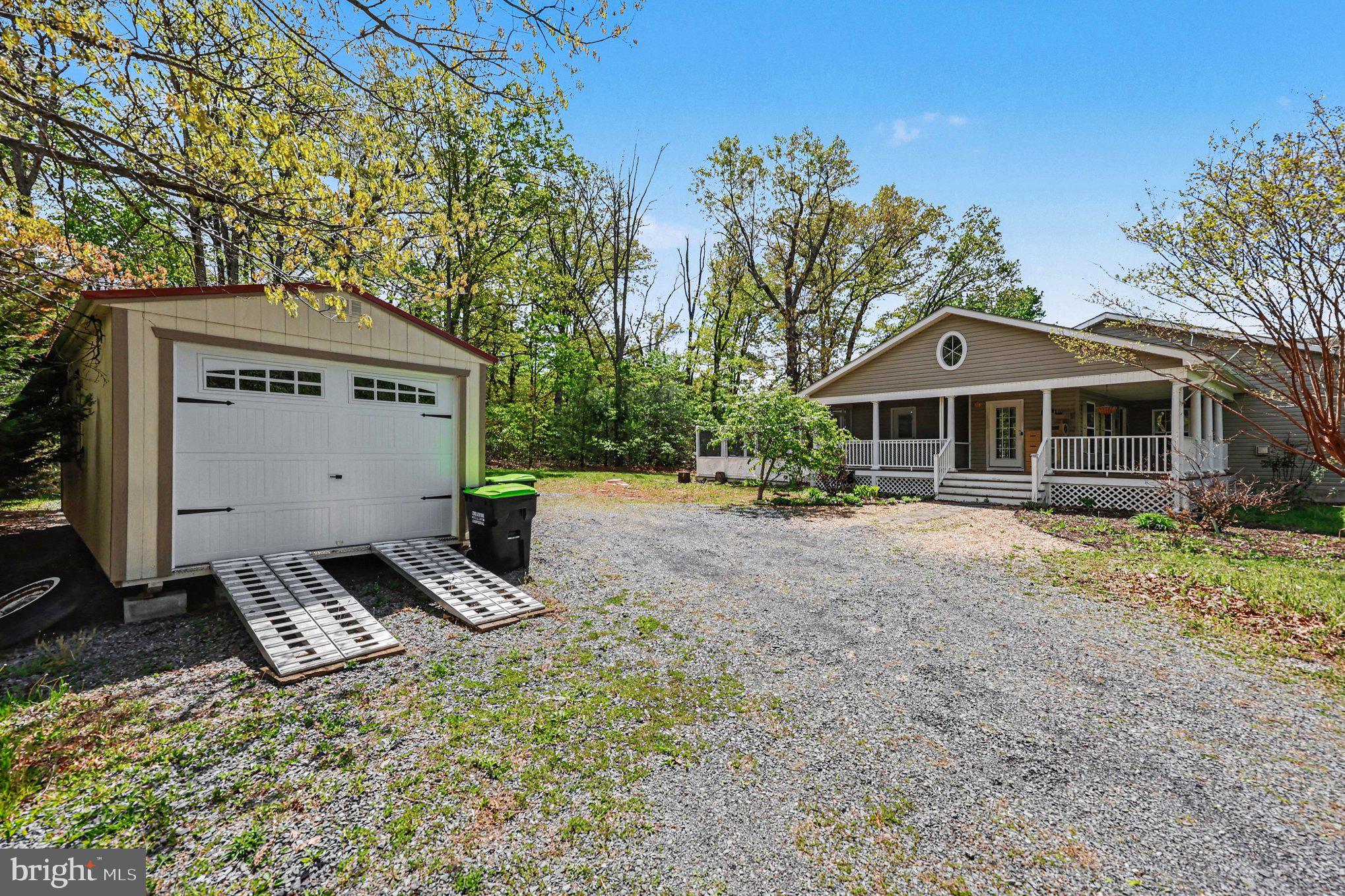 1564 Perry Road Winchester, VA 22602 - Photo 34 of 42 a front view of a house with a yard