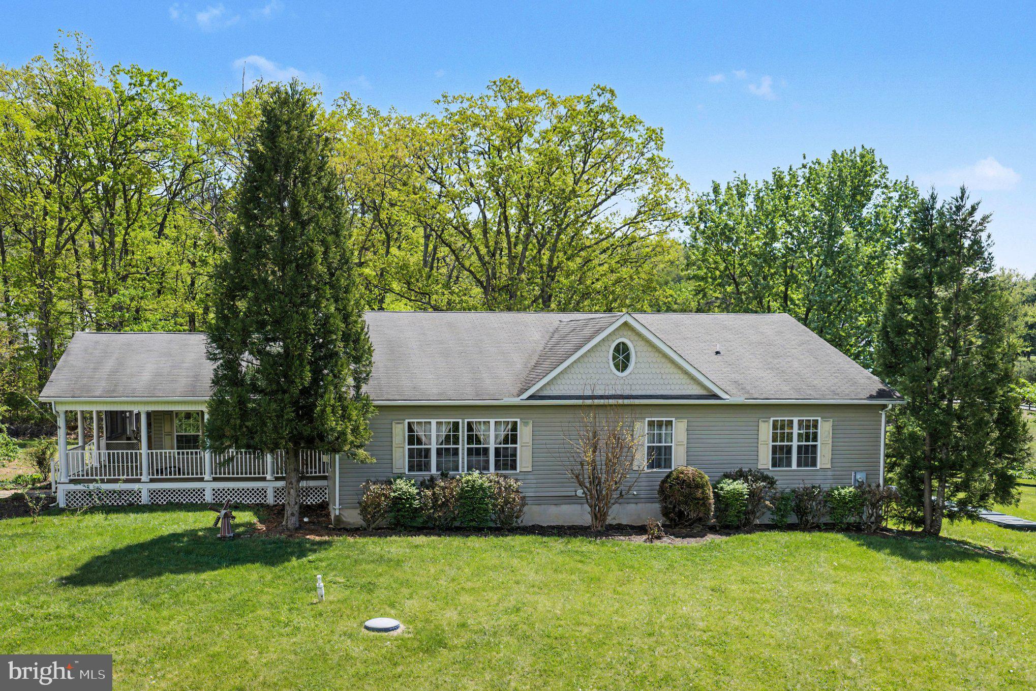 1564 Perry Road Winchester, VA 22602 - Photo 39 of 42 a front view of house with yard and green space