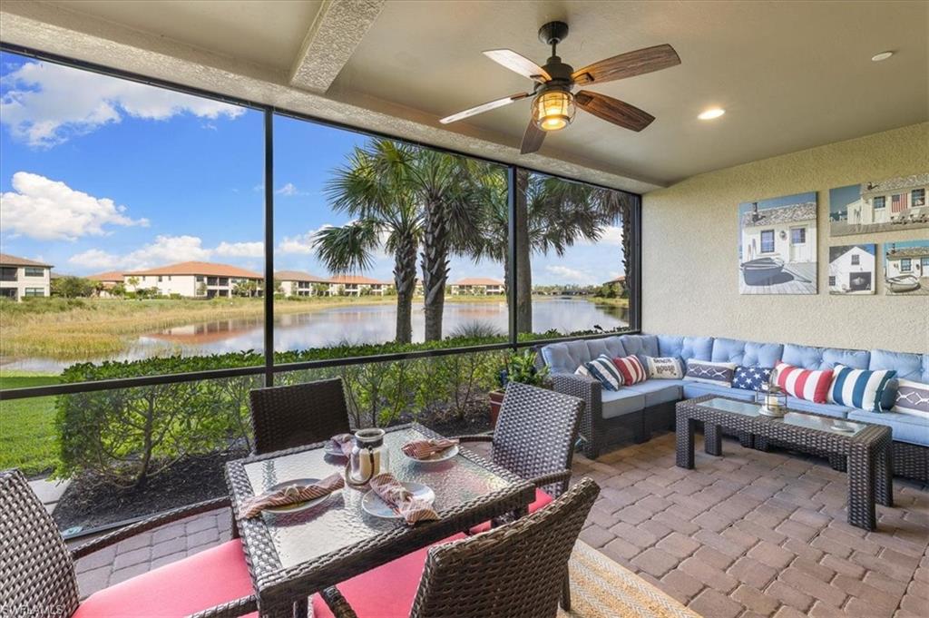 9684 Montelanico Loop, Unit 102 Naples, FL 34119 - Photo 11 of 24 a reading room with furniture and a large window