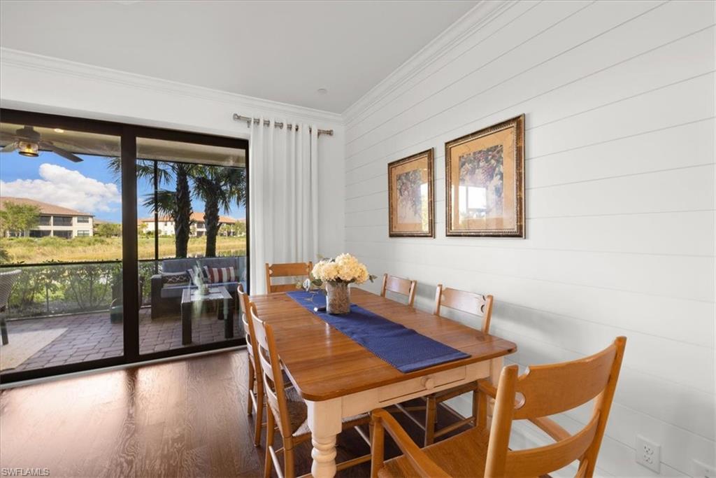 9684 Montelanico Loop, Unit 102 Naples, FL 34119 - Photo 4 of 24 a dining room with furniture and window