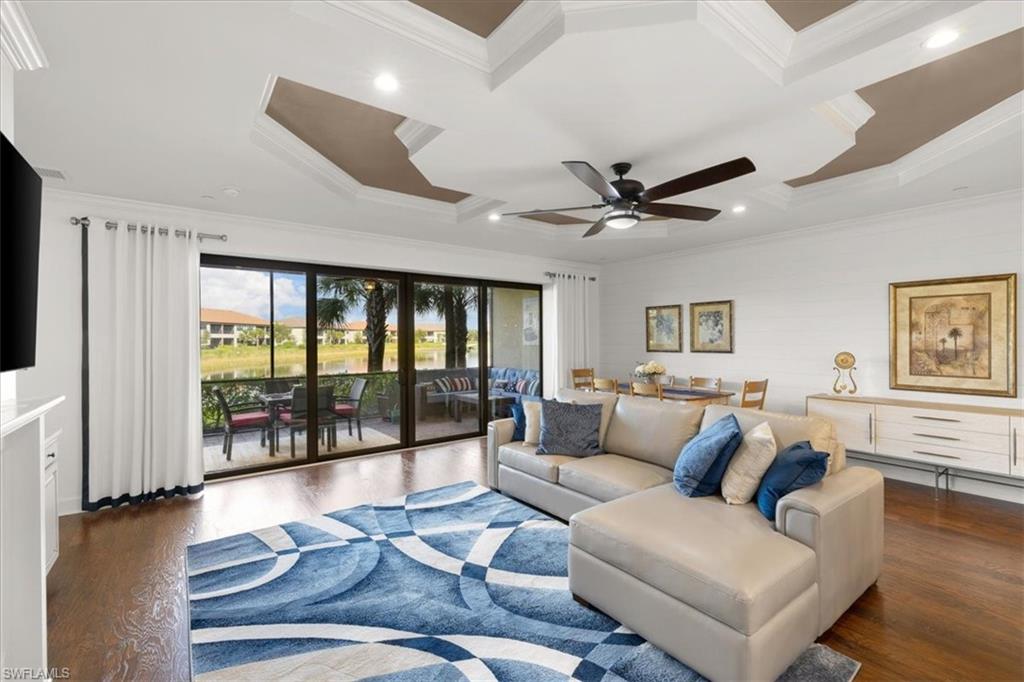 9684 Montelanico Loop, Unit 102 Naples, FL 34119 - Photo 5 of 24 a work room with furniture and a large window