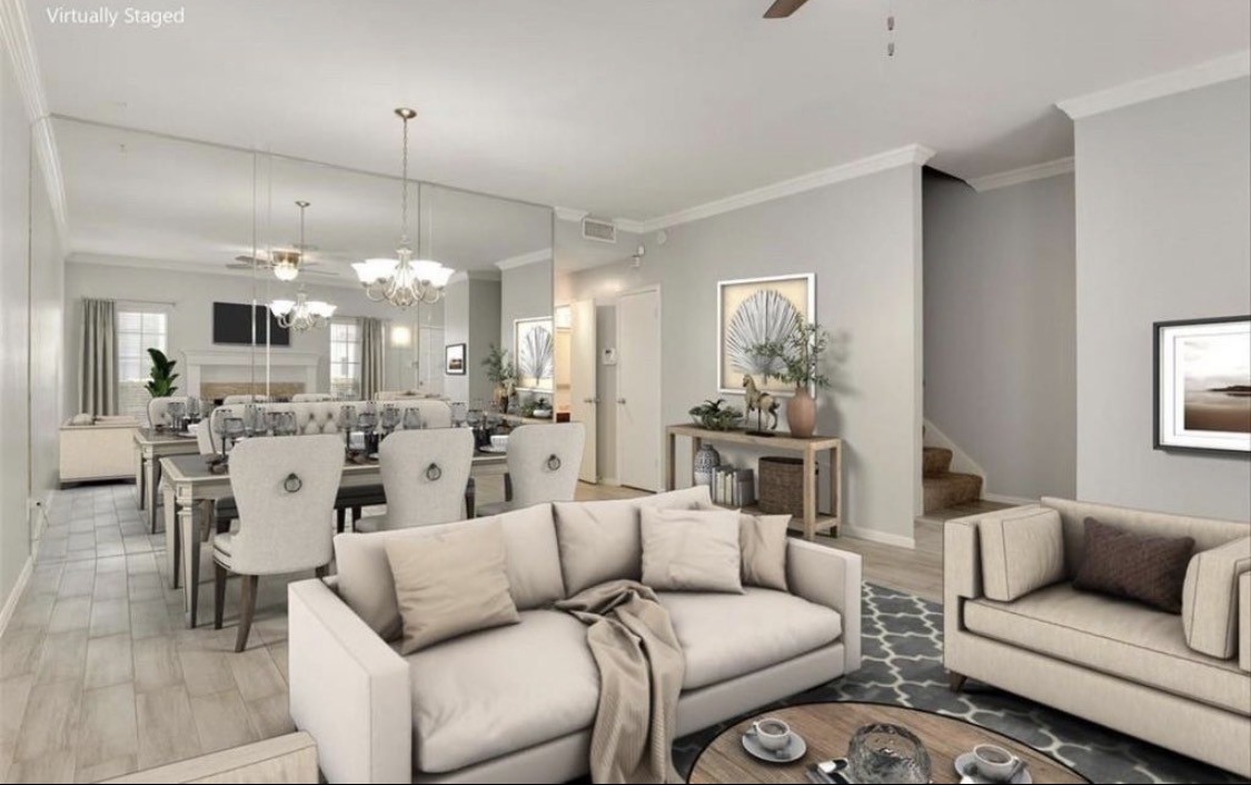 3800 Tanglewilde Street West, Unit 806 Houston, TX 77063 - Photo 3 of 12 a living room with furniture kitchen and a chandelier