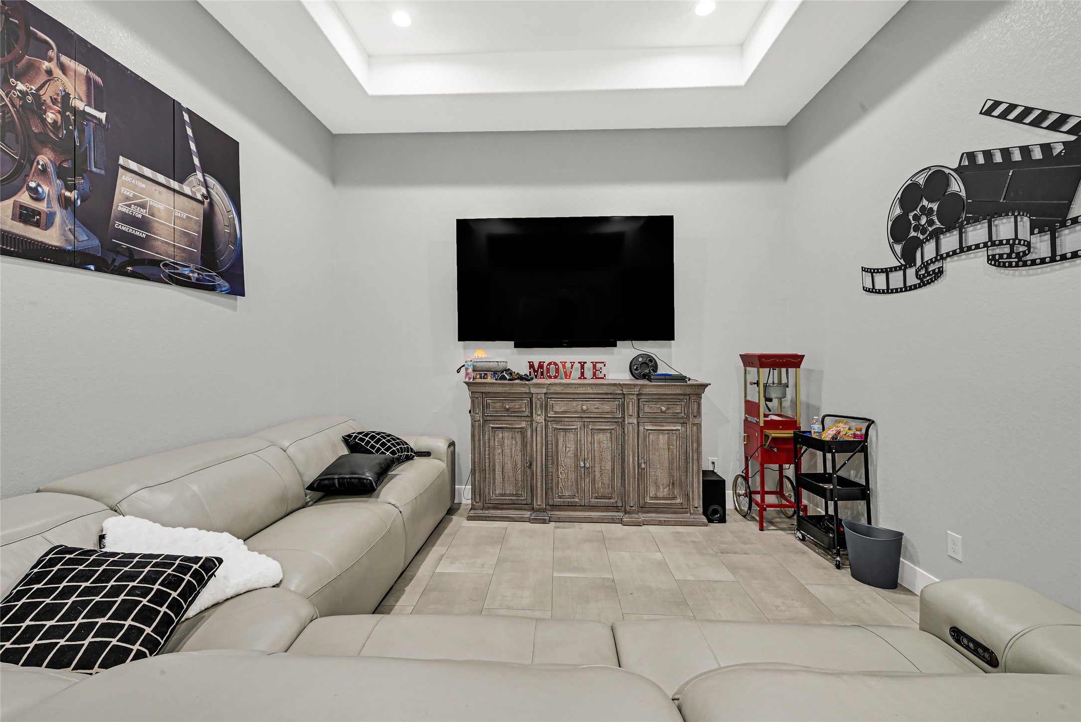 4821 1st Street Houston, TX 77504 - Photo 25 of 48 a living room with furniture and a flat screen tv