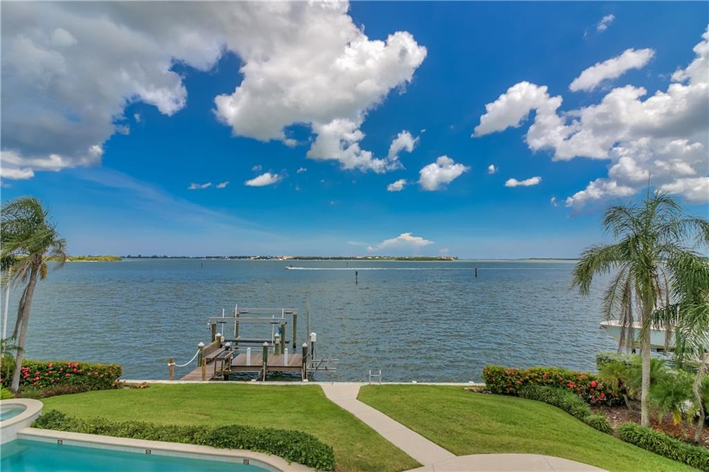 18 Island Road Stuart, FL 34996 - Photo 3 of 58 a view of a lake with a yard