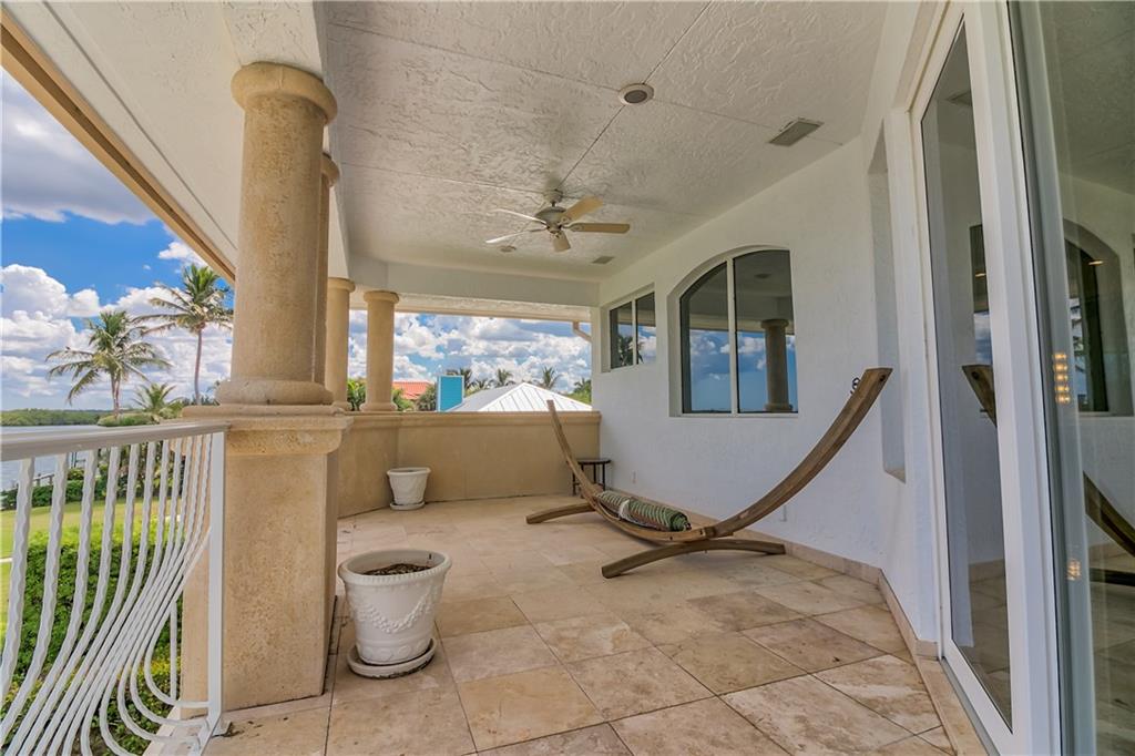 18 Island Road Stuart, FL 34996 - Photo 41 of 58 a view of a living room and a balcony